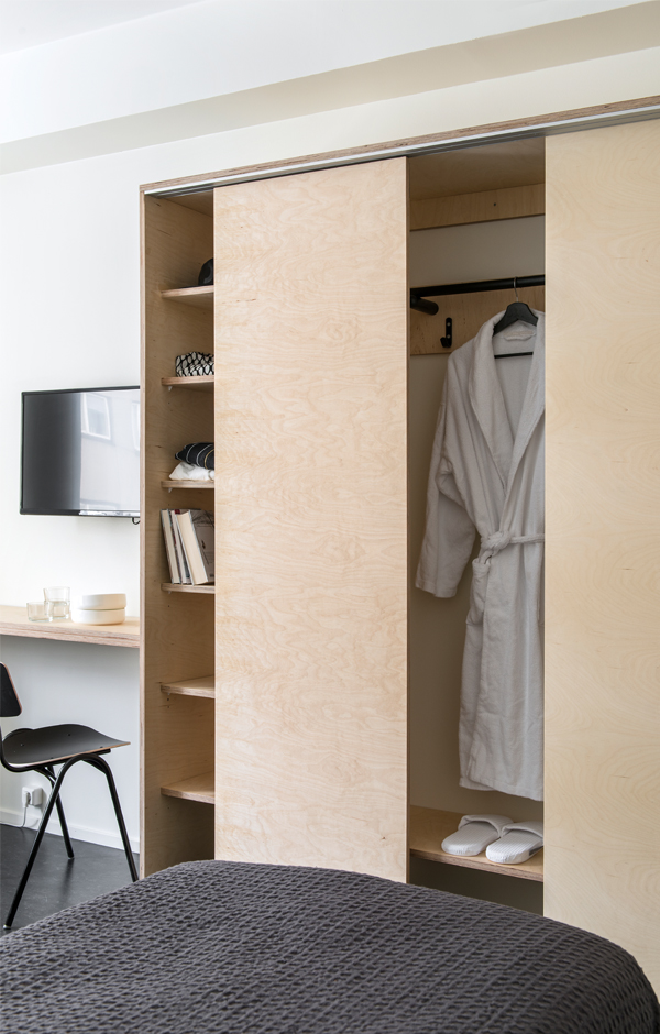 Forenom Hostel Jyväskylä bedroom cabinet plywood interior design Designed by Studio Puisto Architects