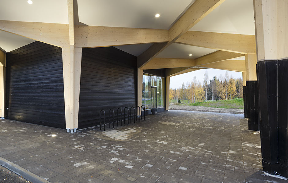 Rest Area Niemenharju main building architectural wooden details black wall Designed by Studio Puisto Architects